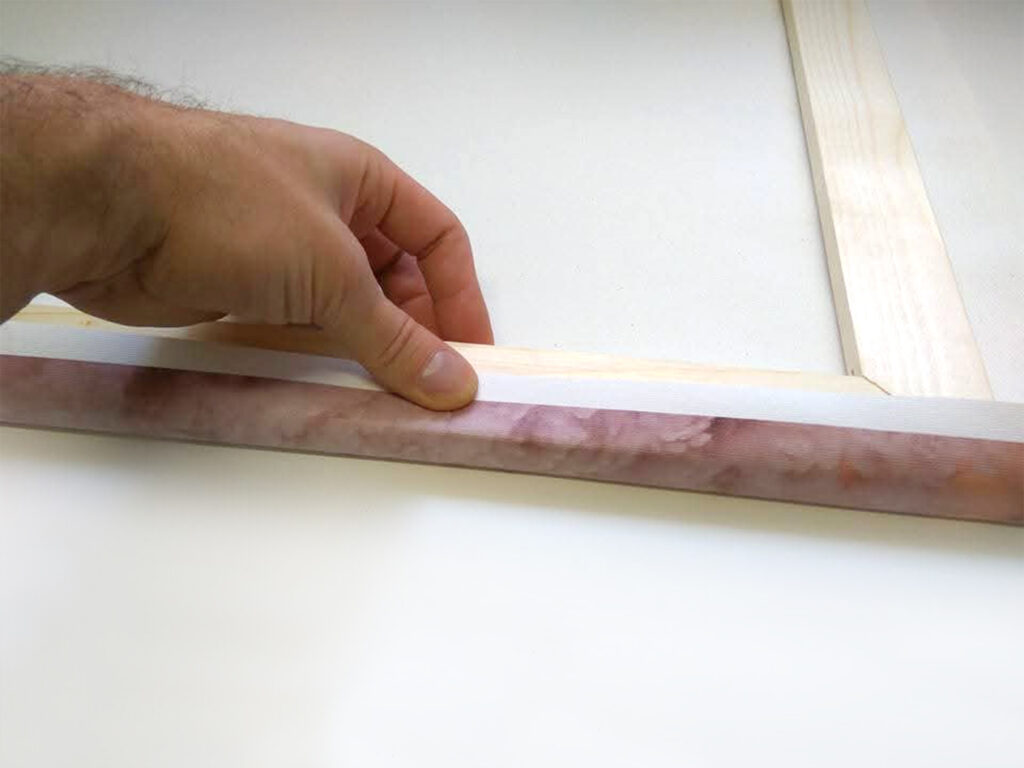 Natahování plátna na blindrám.